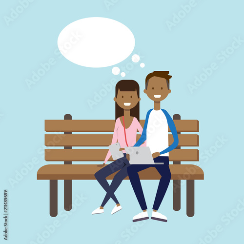 african man woman using laptop sitting wooden bench couple chat bubble character full length over blue background flat vector illustration