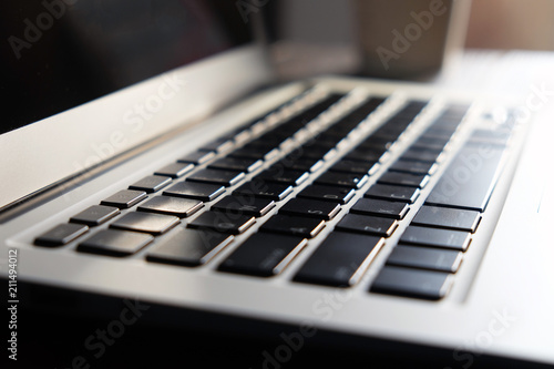 Close up of laptop keyboard with selective focus..