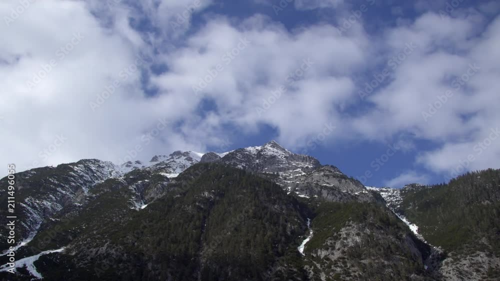 Time lapse of clouds over a mountain in spring in Austria Time lapse of clouds over a mountain in spring in Austria