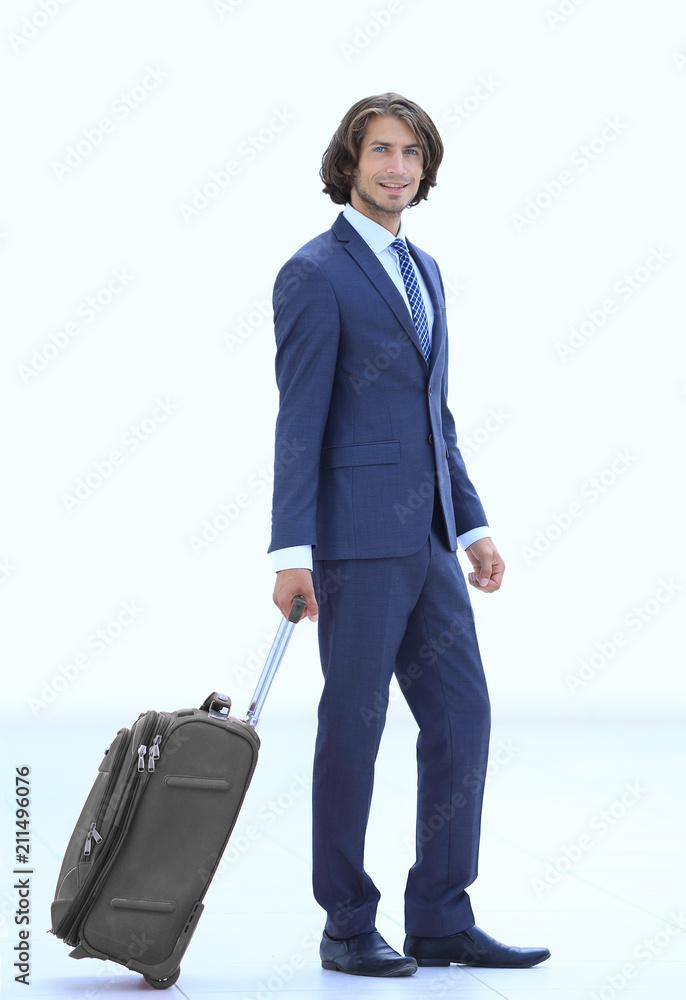 portrait of young businessman with suitcase portrait of young businessman with suitcase