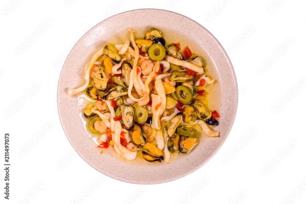 Ceramic plate with the different sea food and olives isolated on white background Ceramic plate with the different sea food and olives isolated on white background