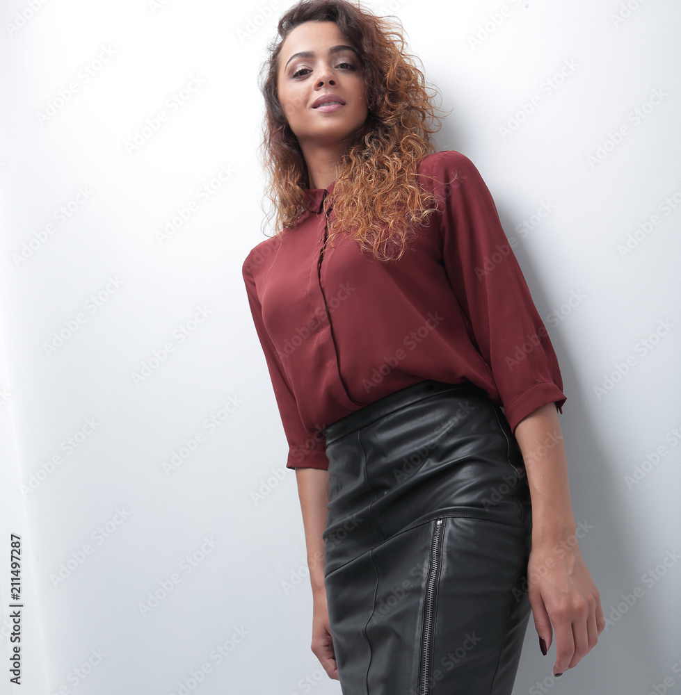 young woman leaning on a white screen young woman leaning on a white screen