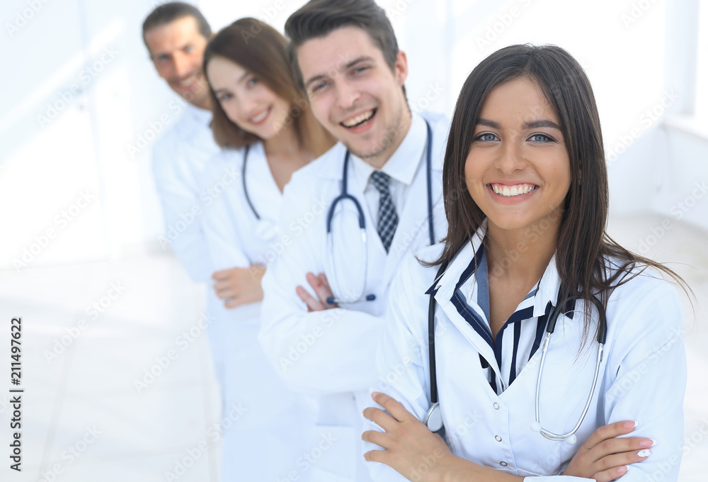 female doctor with group of happy successful colleagues female doctor with group of happy successful colleagues