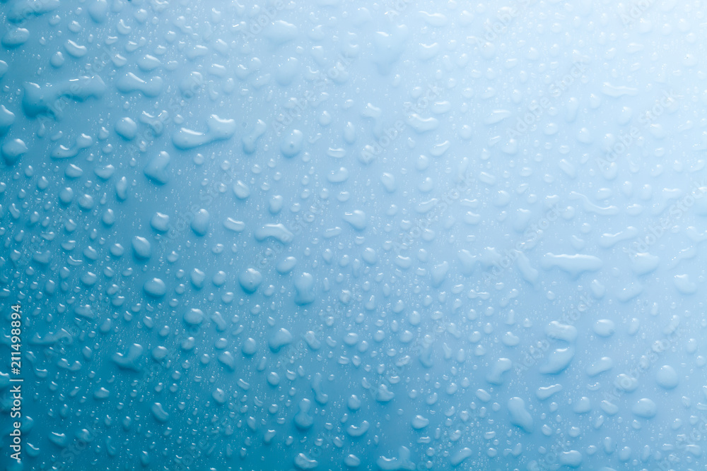 Texture of water drops on blue background Texture of water drops on blue background