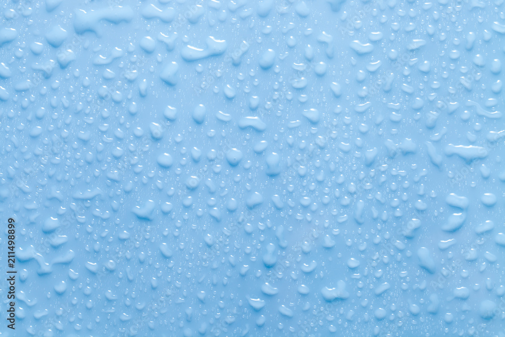 Texture of water drops on blue background Texture of water drops on blue background