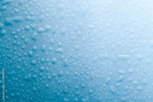 Texture of water drops on blue background