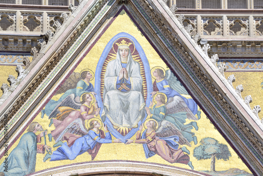 Detail of the facade of the cathedral of Orvieto, Umbria, Italy. Polychrome mosaic