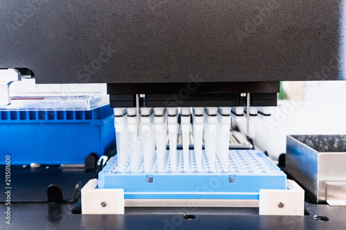 Automation in the clinical laboratory. Pipetting robot laboratory. Medicine robotics. NGS DNA diagnostics. Research and science background