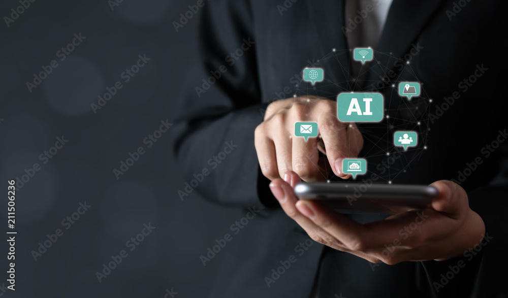 Businessman holding smartphone and touch sign text AI (Artificial Intelligence). Future Technology Concepts. Businessman holding smartphone and touch sign text AI (Artificial Intelligence). Future Technology Concepts.