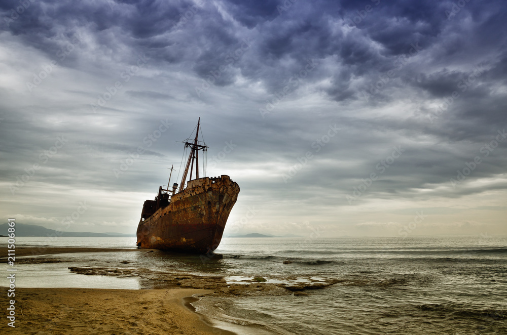 Dimitrios is an old ship wrecked on the Greek coast and abandoned on the beach Dimitrios is an old ship wrecked on the Greek coast and abandoned on the beach