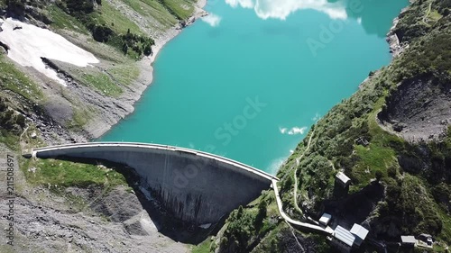Aerial view of the dam of the Lake Barbellino, an Alpine artificial lake. Italian Alps. Italy photo