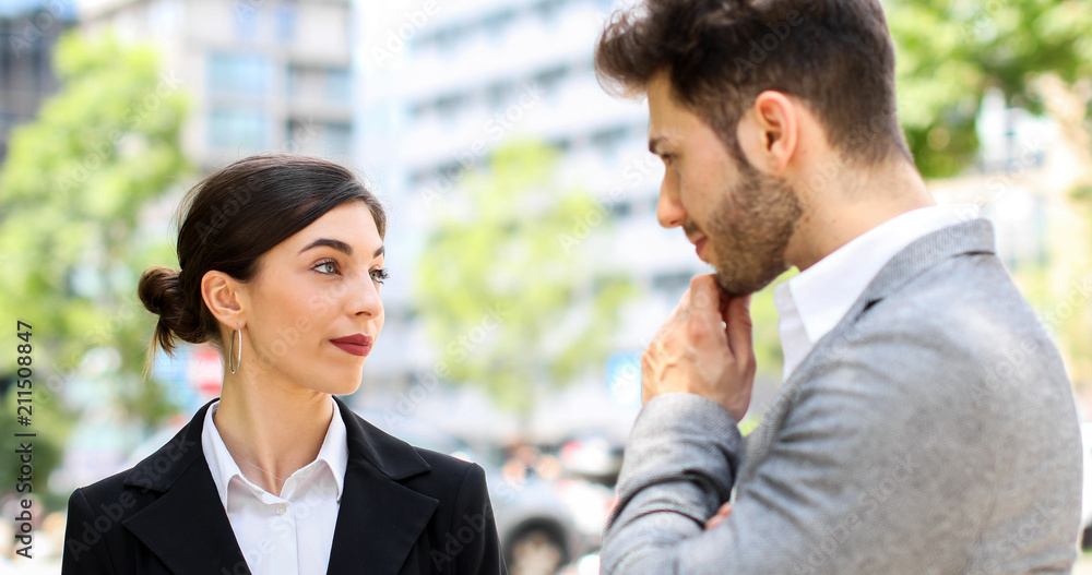 Business partners discussing together Business partners discussing together
