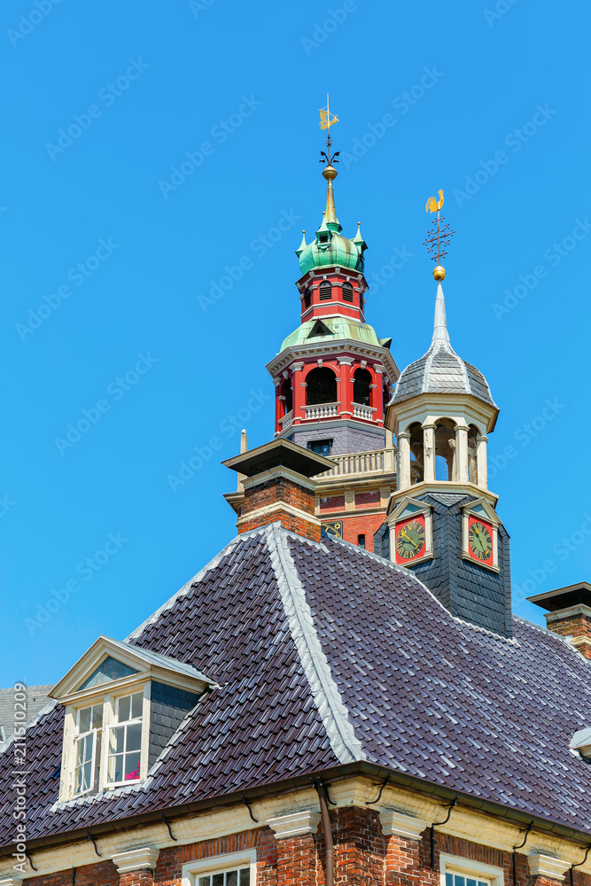 tops of the Old Weigh House and the Grosse Kirche in Leer, Ostfriesland, Germany