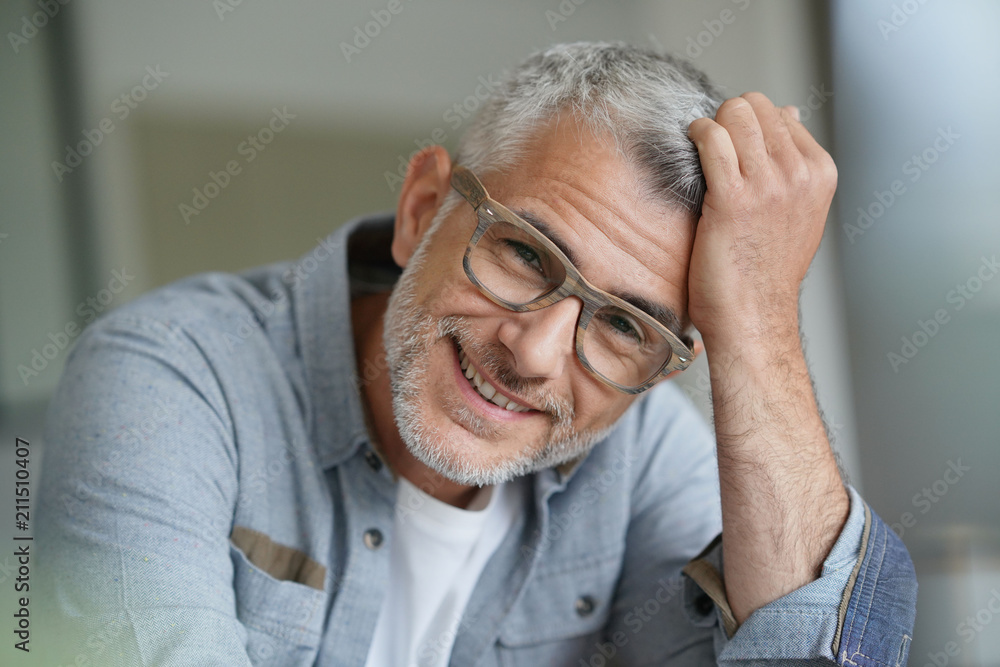 Middle-aged guy with trendy eyeglasses Middle-aged guy with trendy eyeglasses