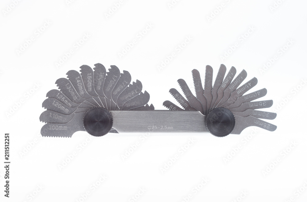 Radius thread pitch gage equipment isolated. Metric whitworth tool for threads per inch. Thread identification device.