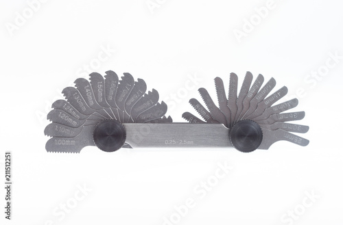 Obraz na płótnie Radius thread pitch gage equipment isolated. Metric whitworth tool for threads per inch. Thread identification device. w salonie