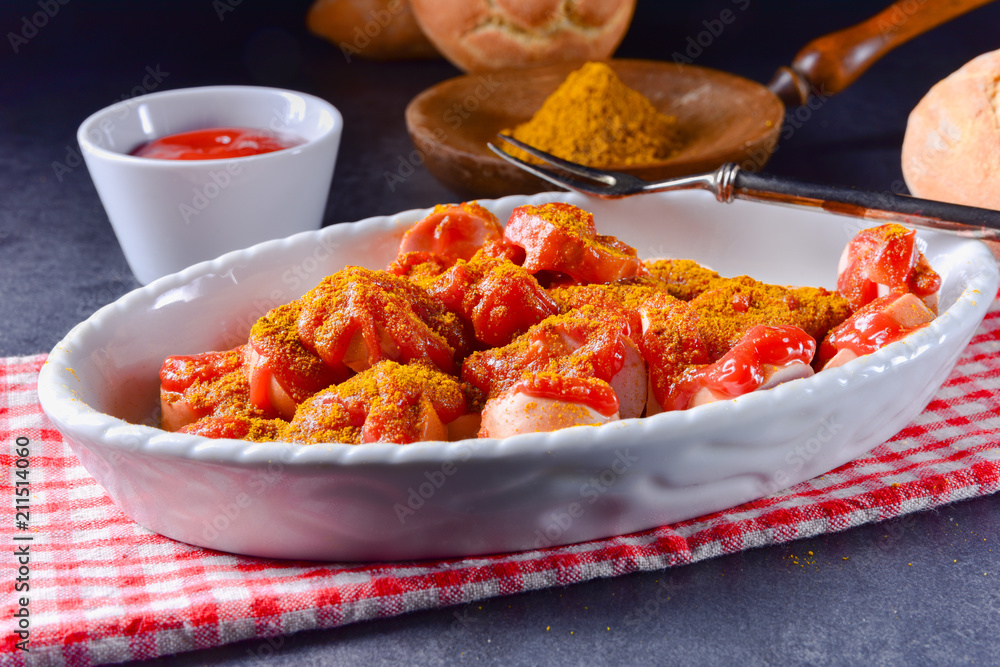 a traditional currywurst in delicious curry sauce a traditional currywurst in delicious curry sauce