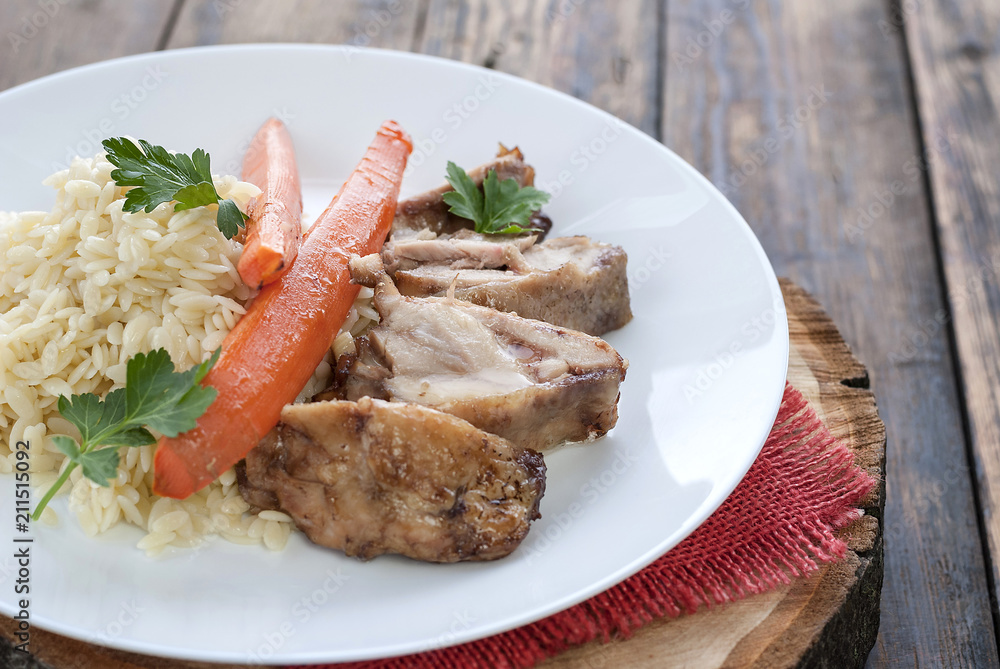 Macaroni with chicken breast and boiled carrots, close-up Macaroni with chicken breast and boiled carrots, close-up