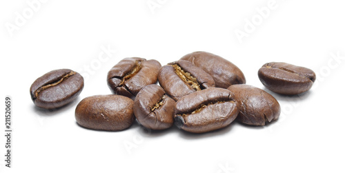 Roasted coffee beans  isolated on white background. Close-up shot of delicious arabica beans  pile or group of objects  cut out.