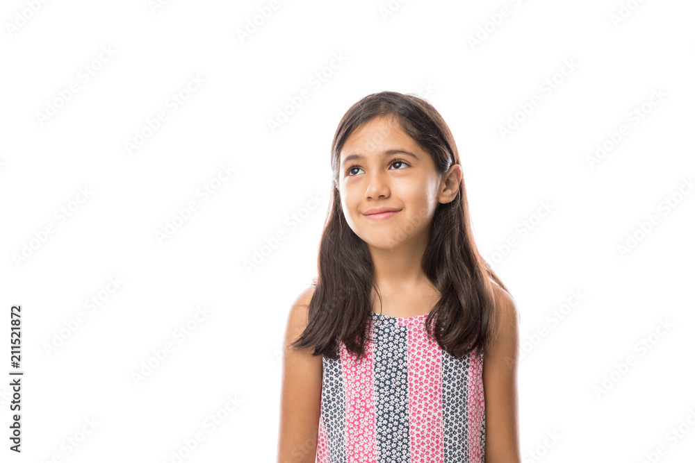 Girl looking away smiling on a light background portrait Girl looking away smiling on a light background portrait
