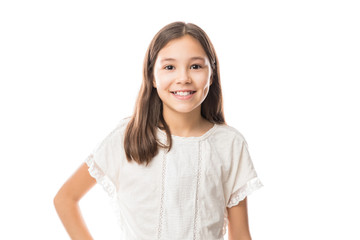 Portrait of a happy little girl over white background