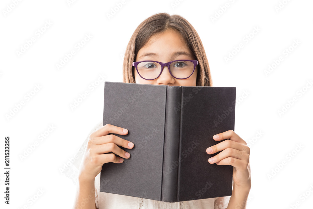 Pretty young girl in glasses hiding behind a black book Pretty young girl in glasses hiding behind a black book