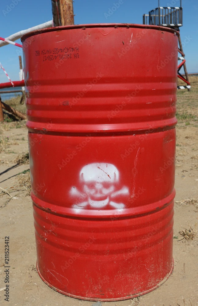 red barrel with dangerous cargo: chemicals, toxic waste materials or poison red barrel with dangerous cargo: chemicals, toxic waste materials or poison