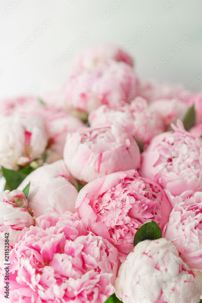 Beautiful bouquet of pink peonies . Floral composition, daylight. Wallpaper. Lovely flowers in glass vase. Beautiful bouquet of pink peonies . Floral composition, daylight. Wallpaper. Lovely flowers in glass vase.