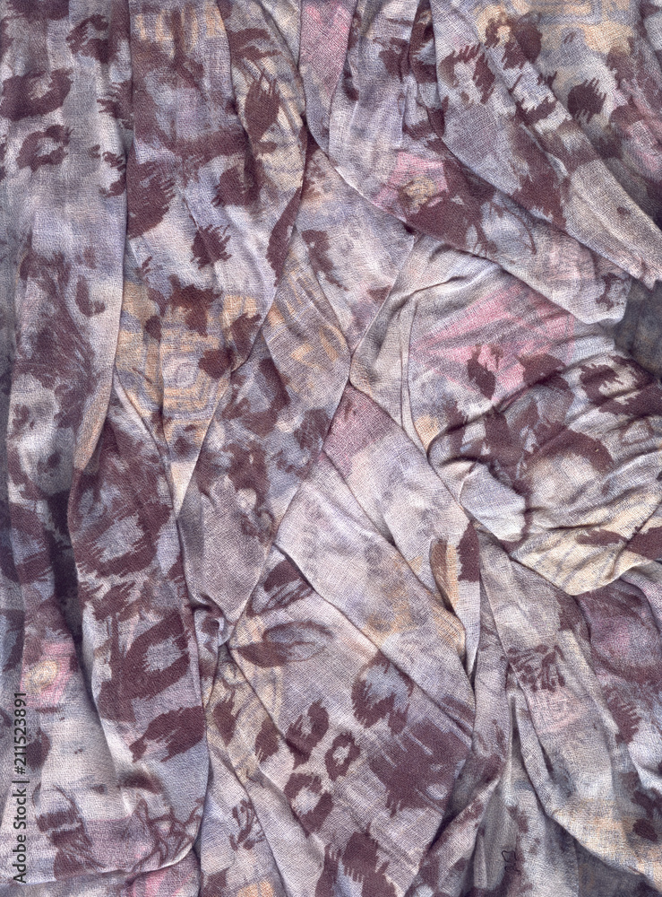 Wrinkled fabric. Abstract background. Texture abstraction. Spotted fabric.