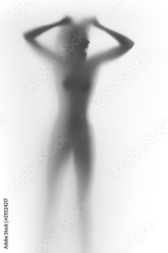 Human female body silhouette. Angry  shouting  screaming face  woman stands  and tears her hair.