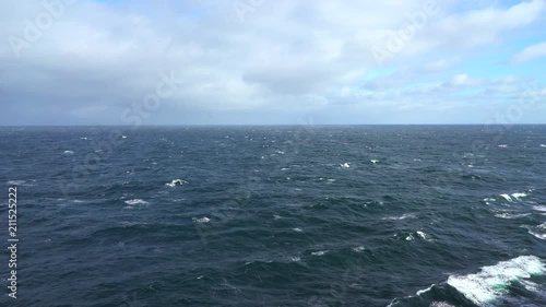 Aerial shot of open ocean - windy sea with waves