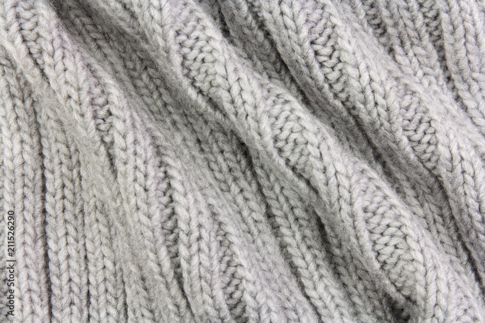 gray fabric texture of rough knitting with folds gray fabric texture of rough knitting with folds