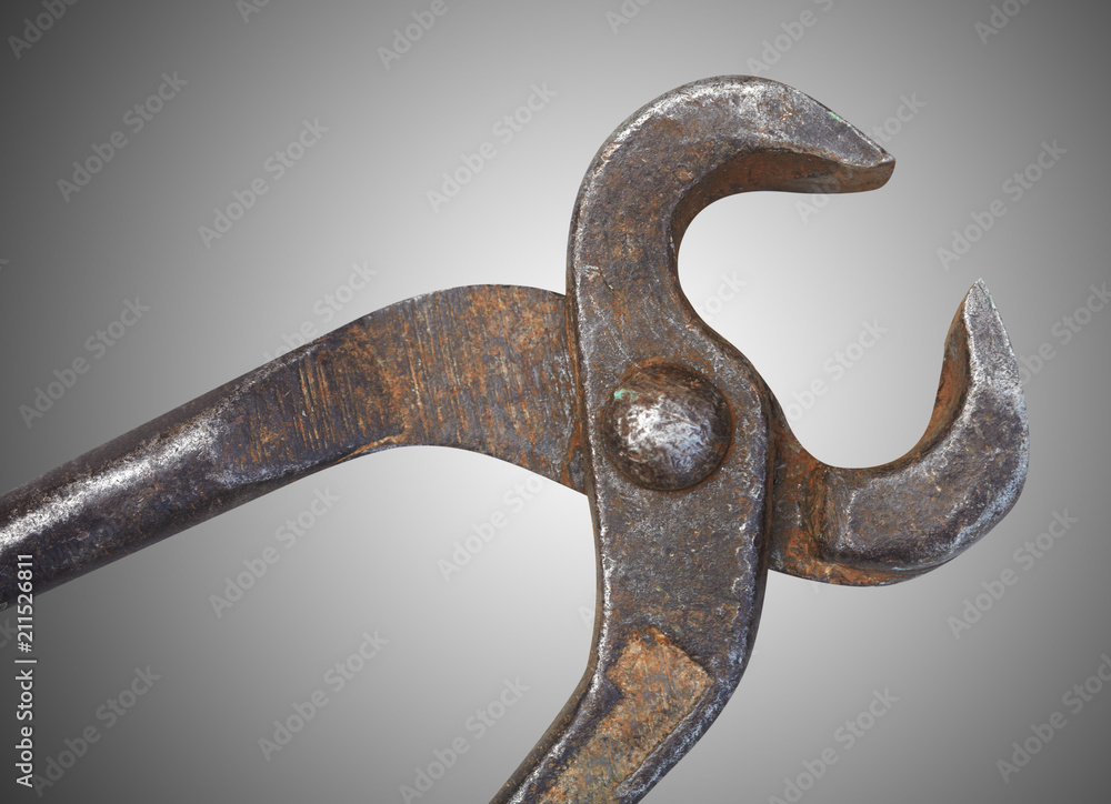 Old nippers on grey background Old nippers on grey background
