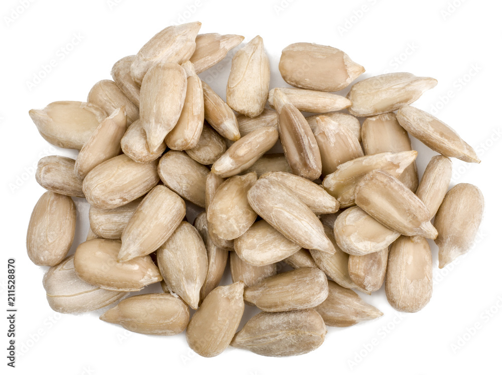 Peeled sunflower seeds isolated on white, top view Peeled sunflower seeds isolated on white, top view
