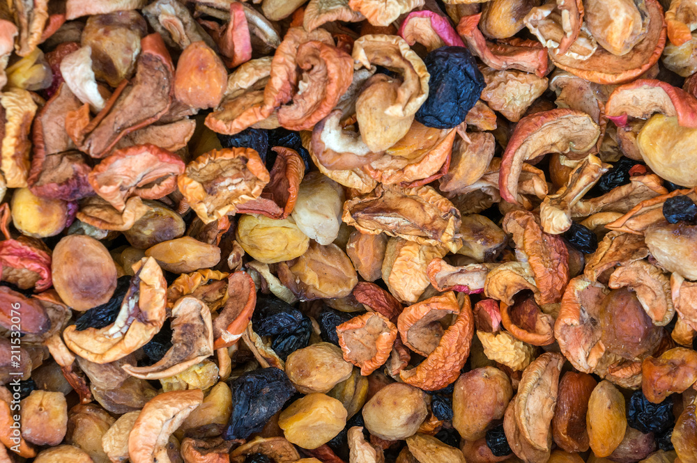 Background of organic dried fruits and home-made nuts. Close up