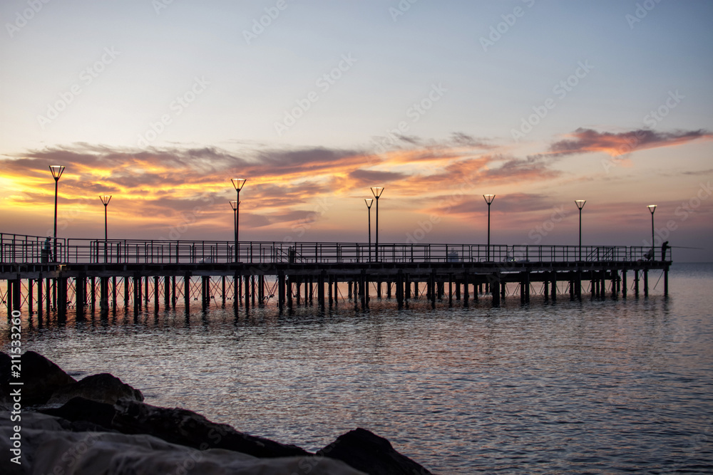 View of the colonnade along the sea at sunrise, Limassol, Cyprus