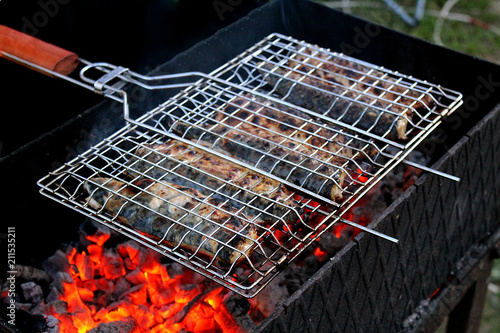 fried fish on grill