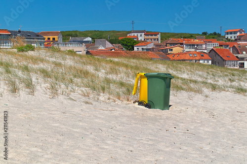 Trash cans on the beach.