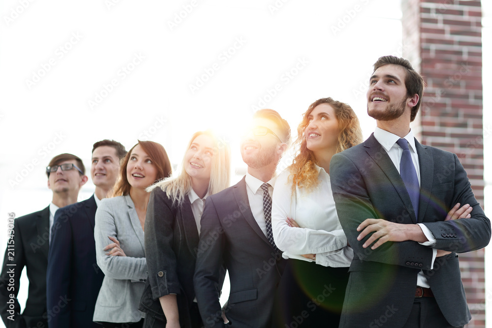 successful business team looking at copy space. successful business team looking at copy space.