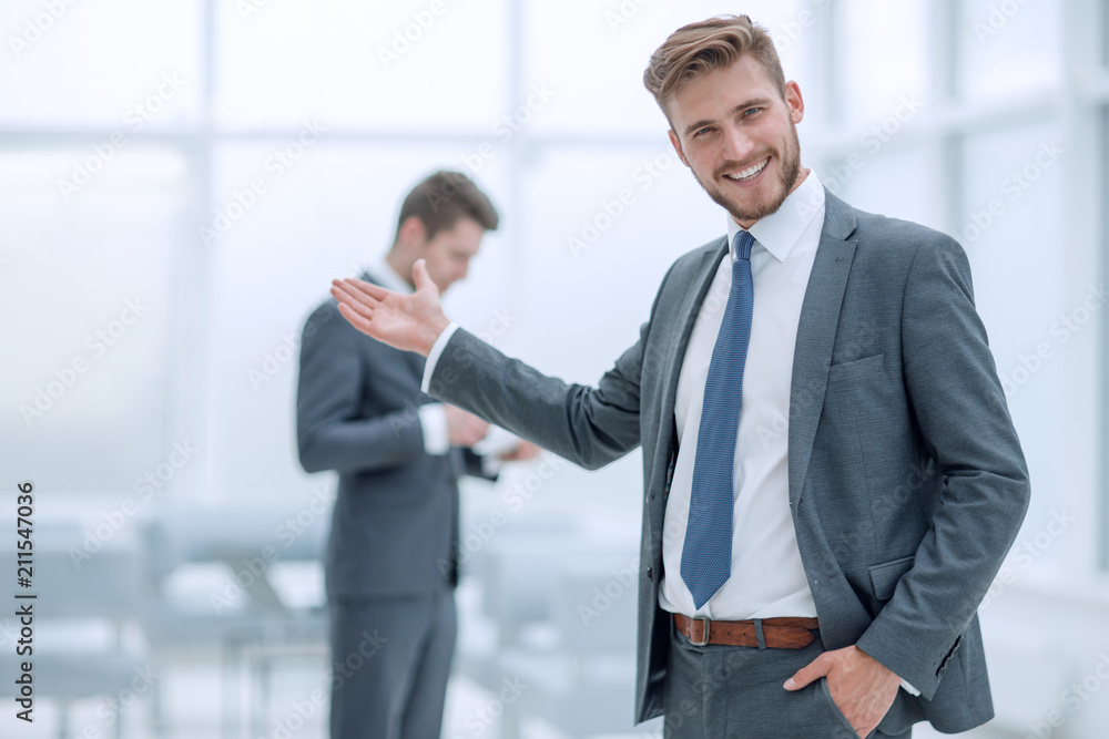 successful businessman invites you to the office. successful businessman invites you to the office.