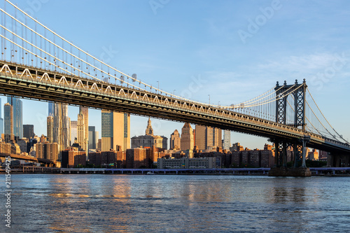 Fototapeta Naklejka Na Ścianę i Meble -  New York City / USA - JUN 25 2018: Brooklyn Bridge Park with Lower Manhattan skyline at sunrise