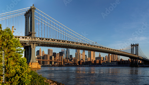 New York City / USA - JUN 25 2018: Brooklyn Bridge Park with Lower Manhattan skyline at sunrise © Edi Chen