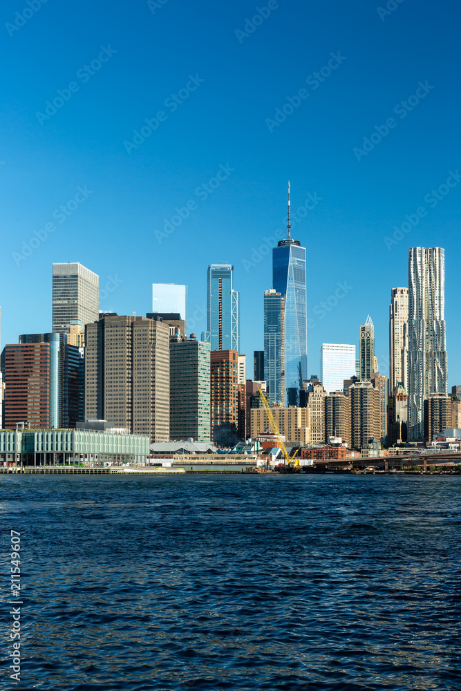 New York City / USA - JUN 25 2018: Lower Manhattan skyline in daylight