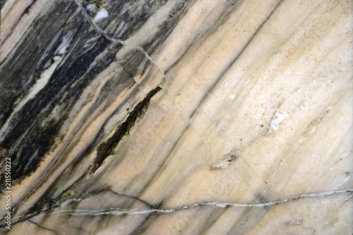 Multicolored layered marble texture with different veins, may be used as background