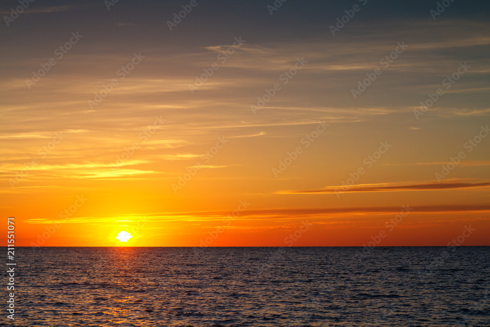 beautiful sunset with clouds over the sea