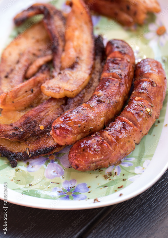 Unhealthy but tasty grilled sausages and meat Unhealthy but tasty grilled sausages and meat