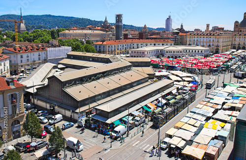 Porta Palazzo old traditional market in Turin, Italy, aerial view with cityscape