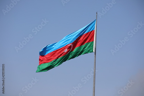 Azerbaijan national flag with Crescent moon. Flags waving wind