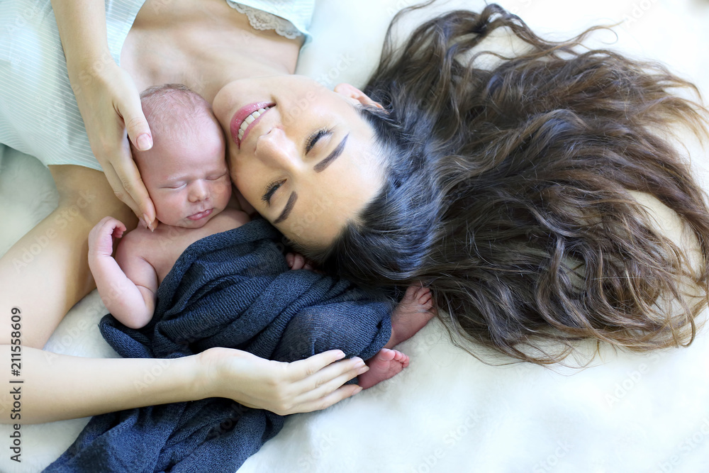 sleeping newborn baby with a mother sleeping newborn baby with a mother