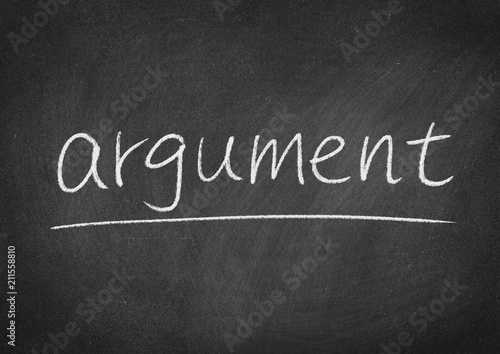 argument concept word on a blackboard background